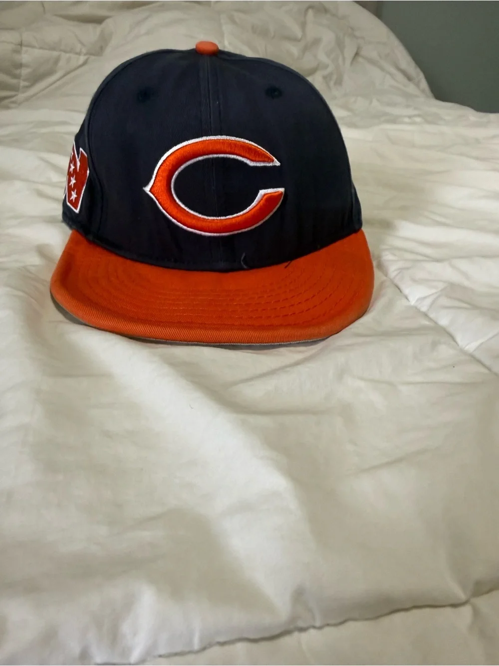 New Era men’s Navy and Orange Snapback with 'C' Logo
